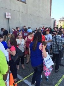 Crowd forming in Bookends parking lot 