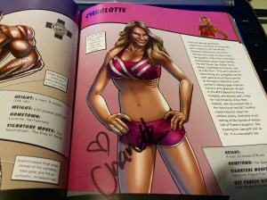 Charlotte autograph in "WWE Ultimate Superstar Guide"